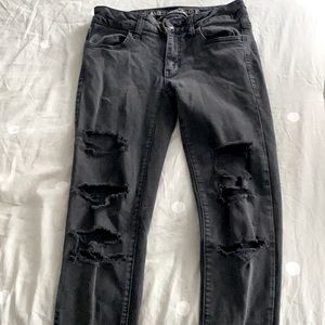 Distressed black ripped jeans super super stretch